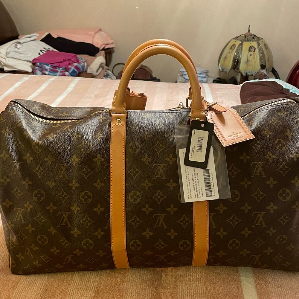 Louis Vuitton 55 inch weekender duffle bag brand new